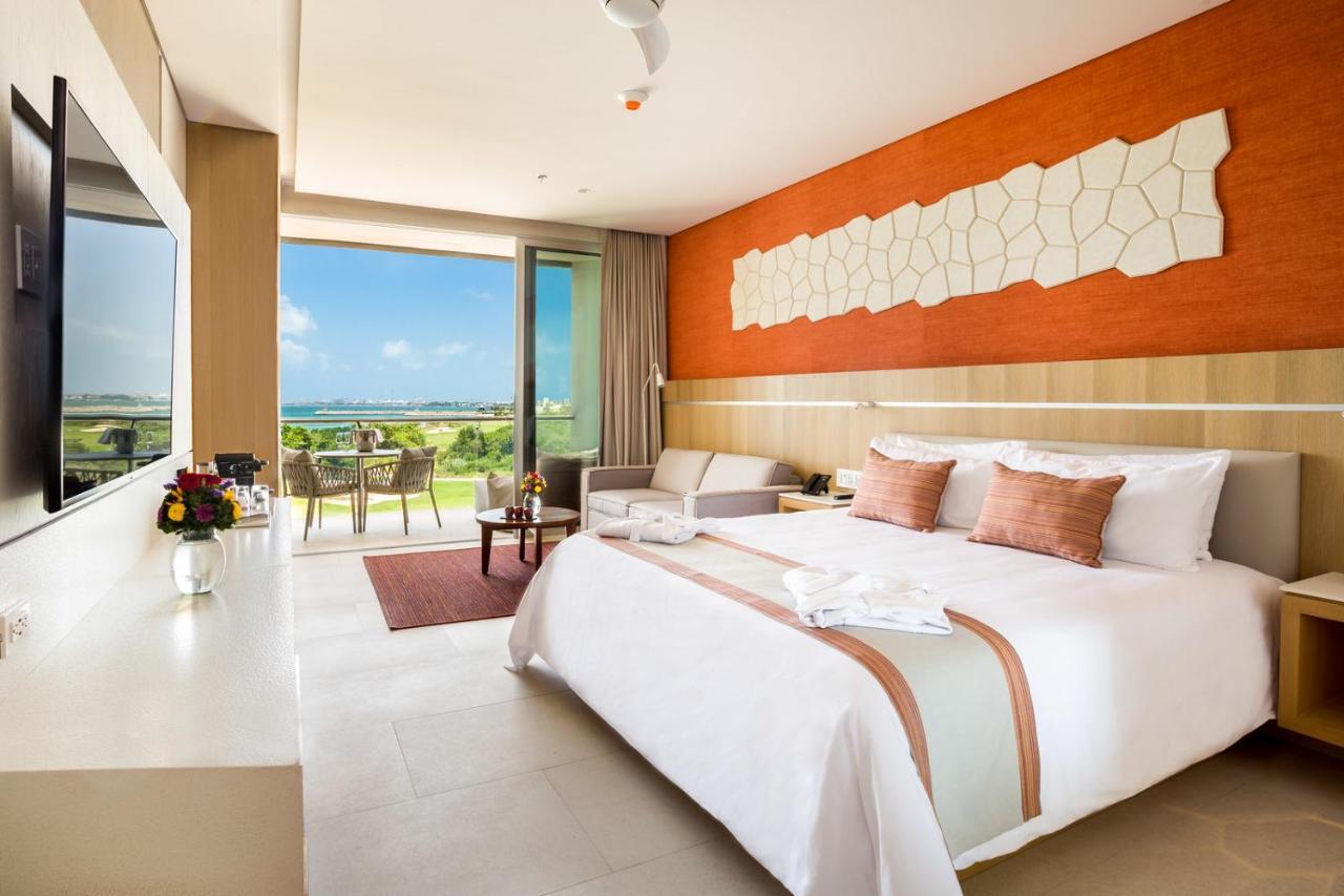 Habitación Deluxe con vistas al océano y al campo de golf - 1 cama extragrande