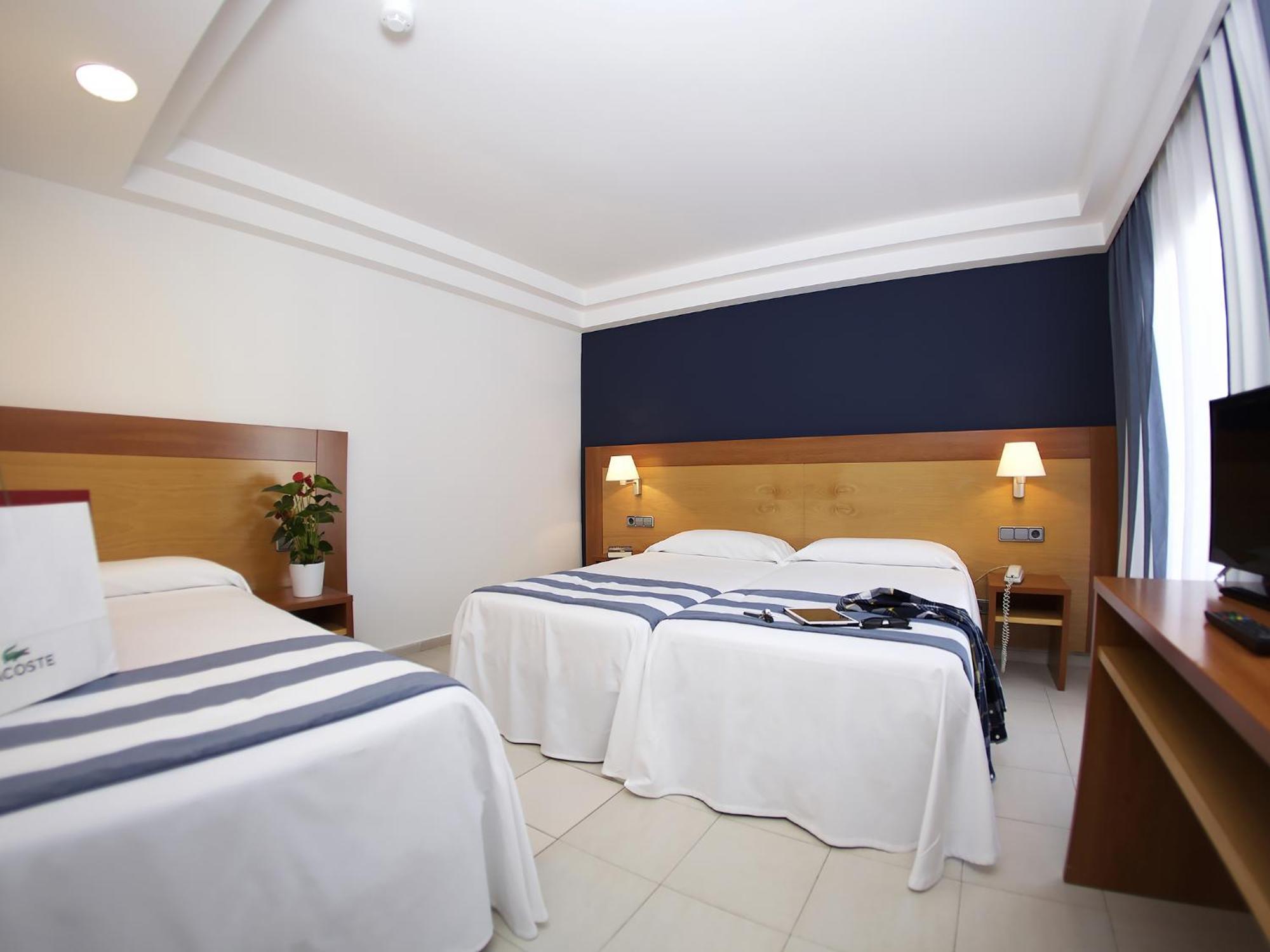 Basic Triple Room (2 Adults + 1 Child) Without Balcony