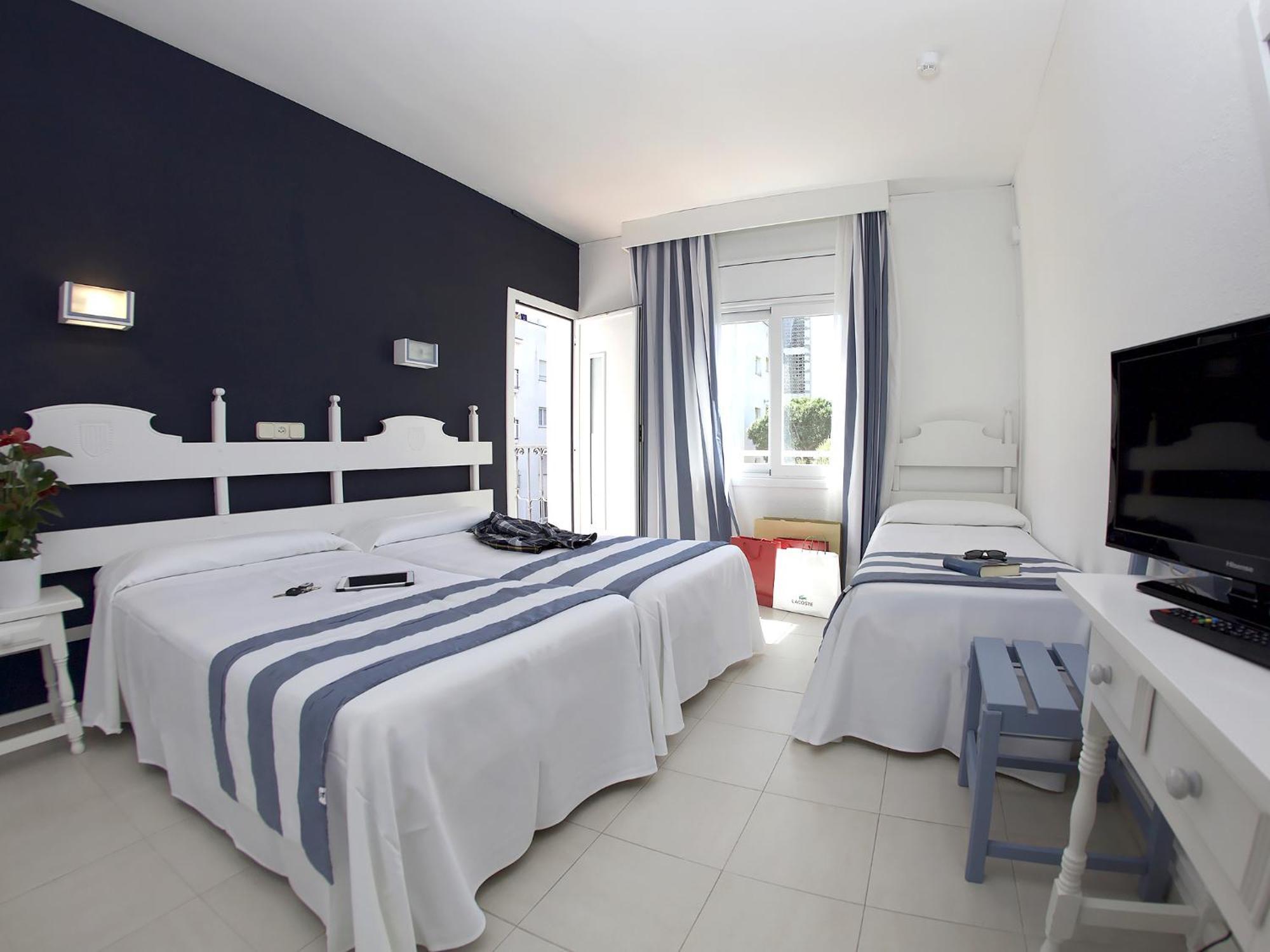 Triple Room (2 Adults + 1 Child) with Balcony