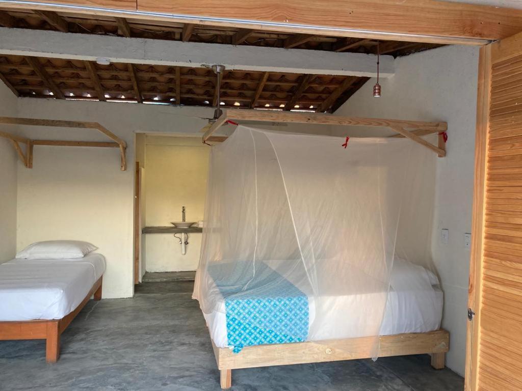 Habitación Triple Confort con ducha