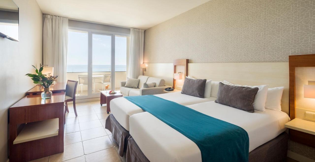 Triple Room with Sea View (2 Adults + 2 Children),1403305388:JPEG