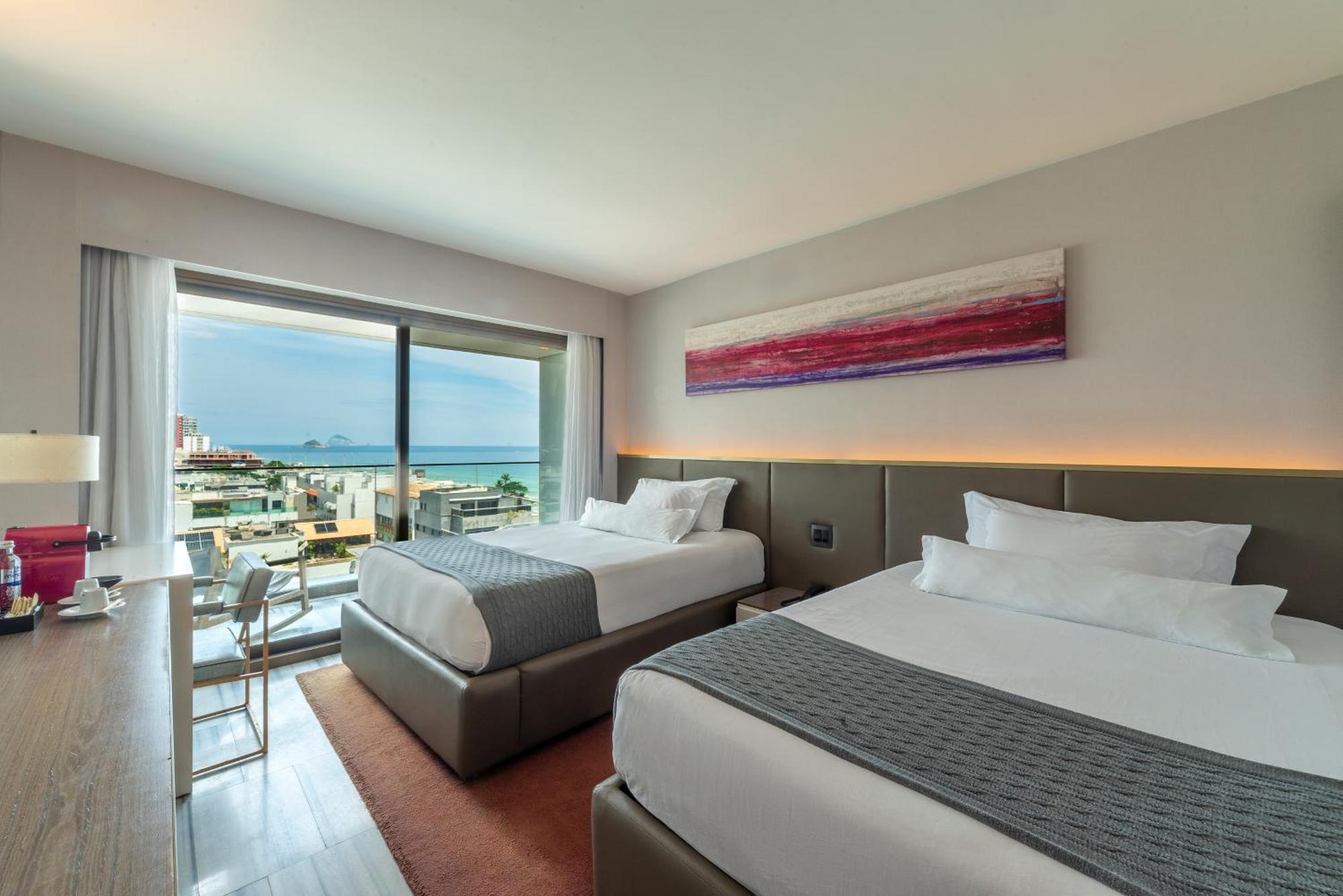 Habitación Doble Deluxe con vistas laterales al mar
