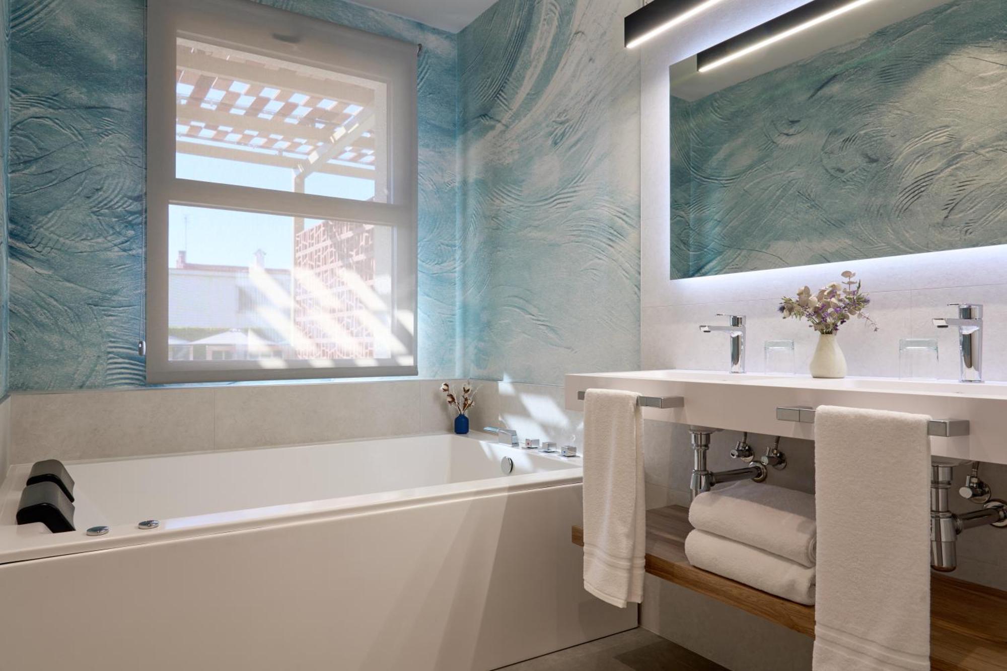 Suite con bañera de hidromasaje - Cama extragrande