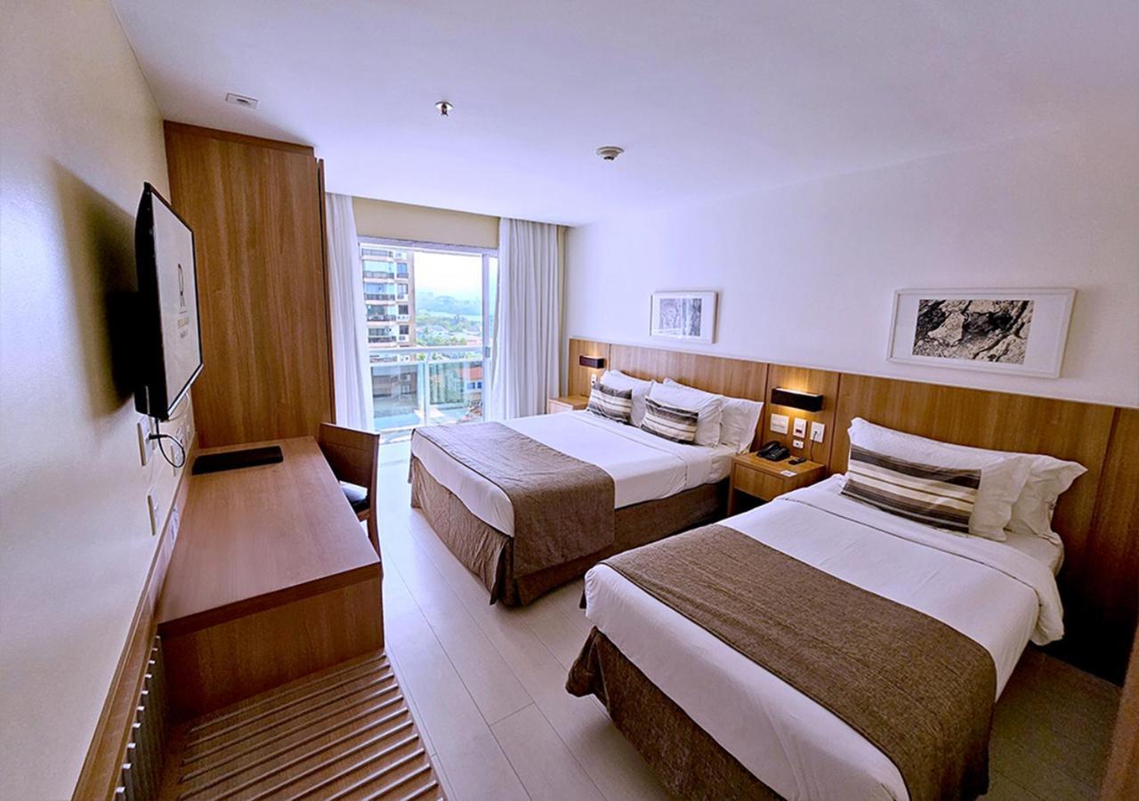 Quarto Triplo Superior Vista Lateral Mar com Banheira de Hidromassagem e Varanda,1616429411:JPEG